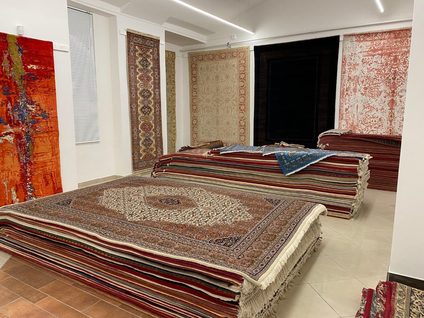 An extensive selection of colourful hand-knotted rugs inside the Carpeteria shop